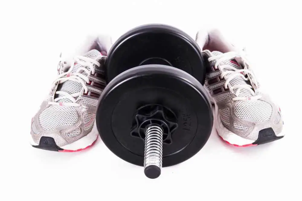 weight lifting shoes and dumbbell